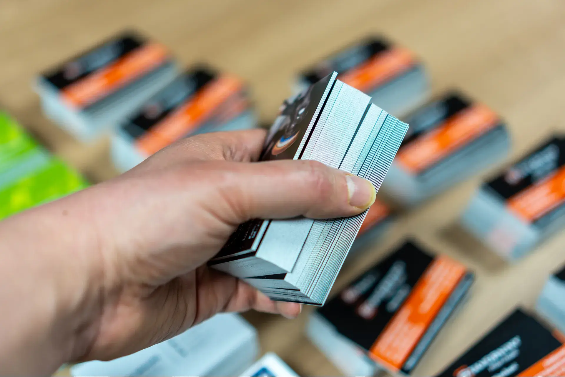 hand holding some custom houston business cards